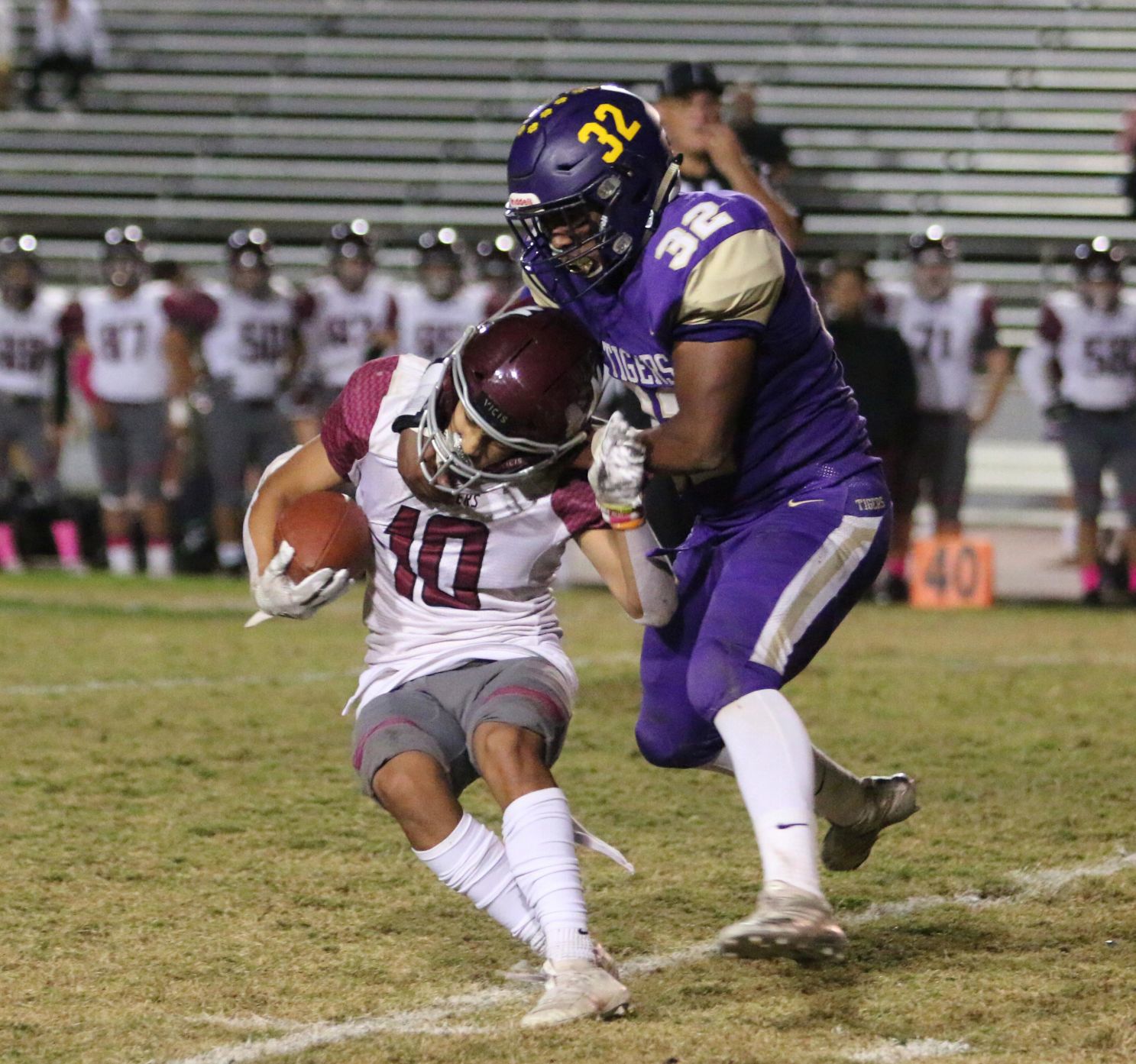 Tigers stay hot with 42-6 rout of Pioneers, clinch playoff spot
